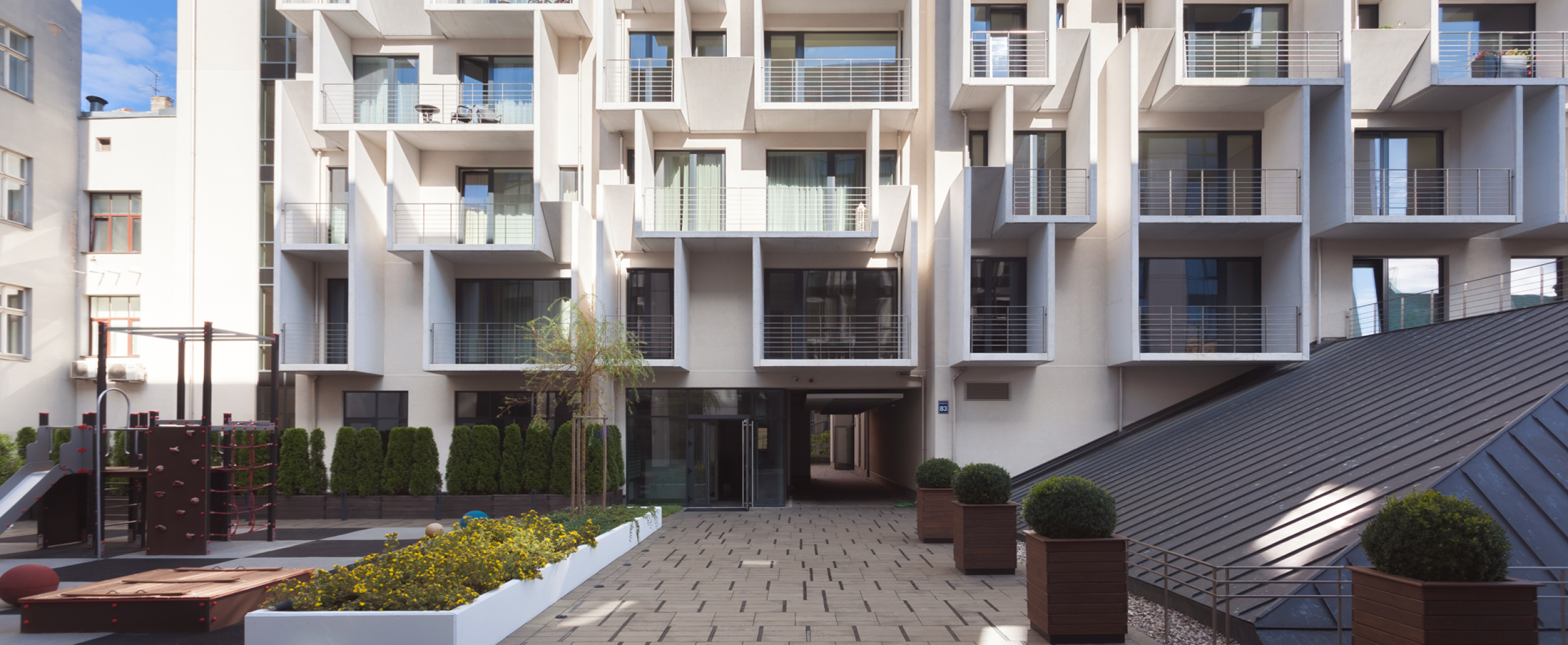 CENTRUS first-stage buildings with a landscaped children’s playground created for residents’ families in central Riga.