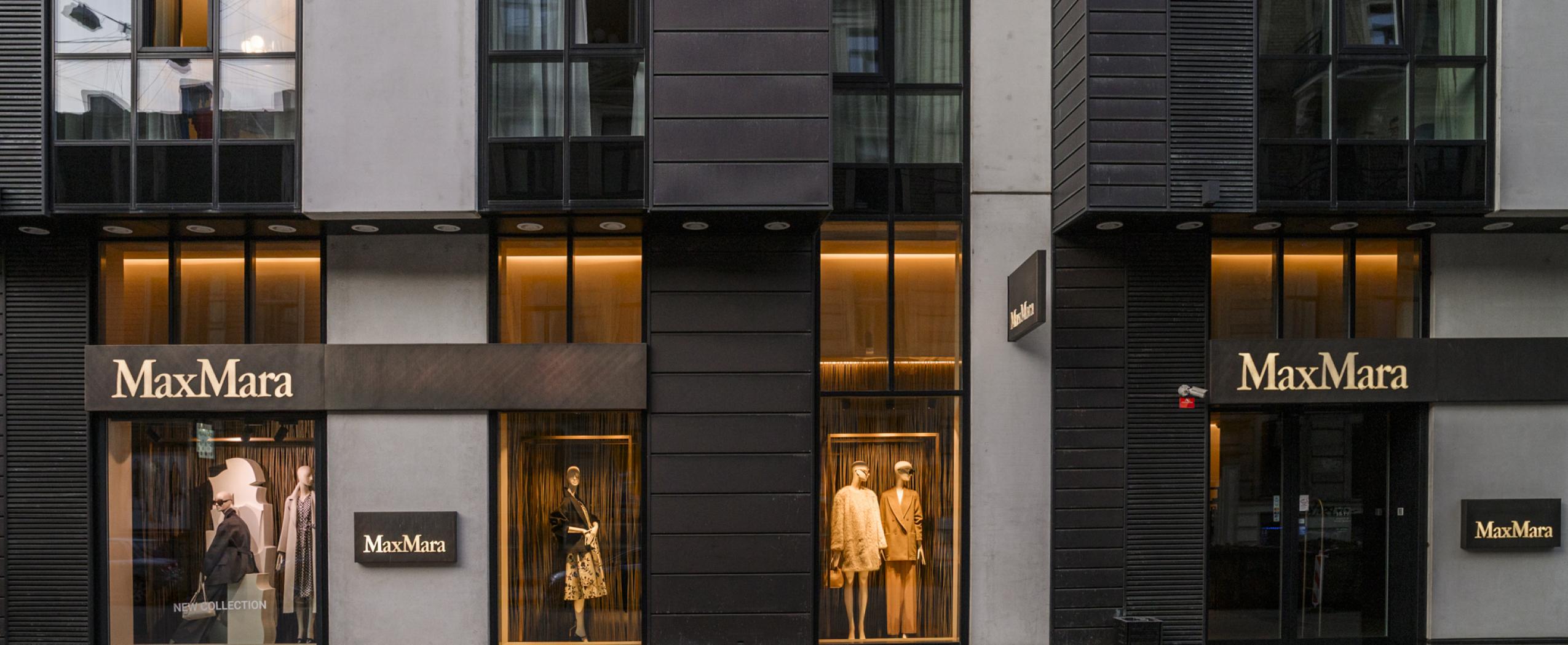 CENTRUS first-stage building on Dzirnavu Street with ground-floor shops and modern architecture in central Riga.