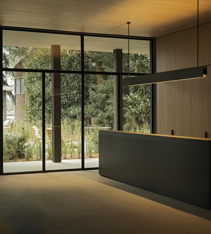 CENTRUS kvartāla ēku koplietošanas telpu skats ar mūsdienīgu dizainu un ērtībām iedzīvotājiem Rīgas centrā.